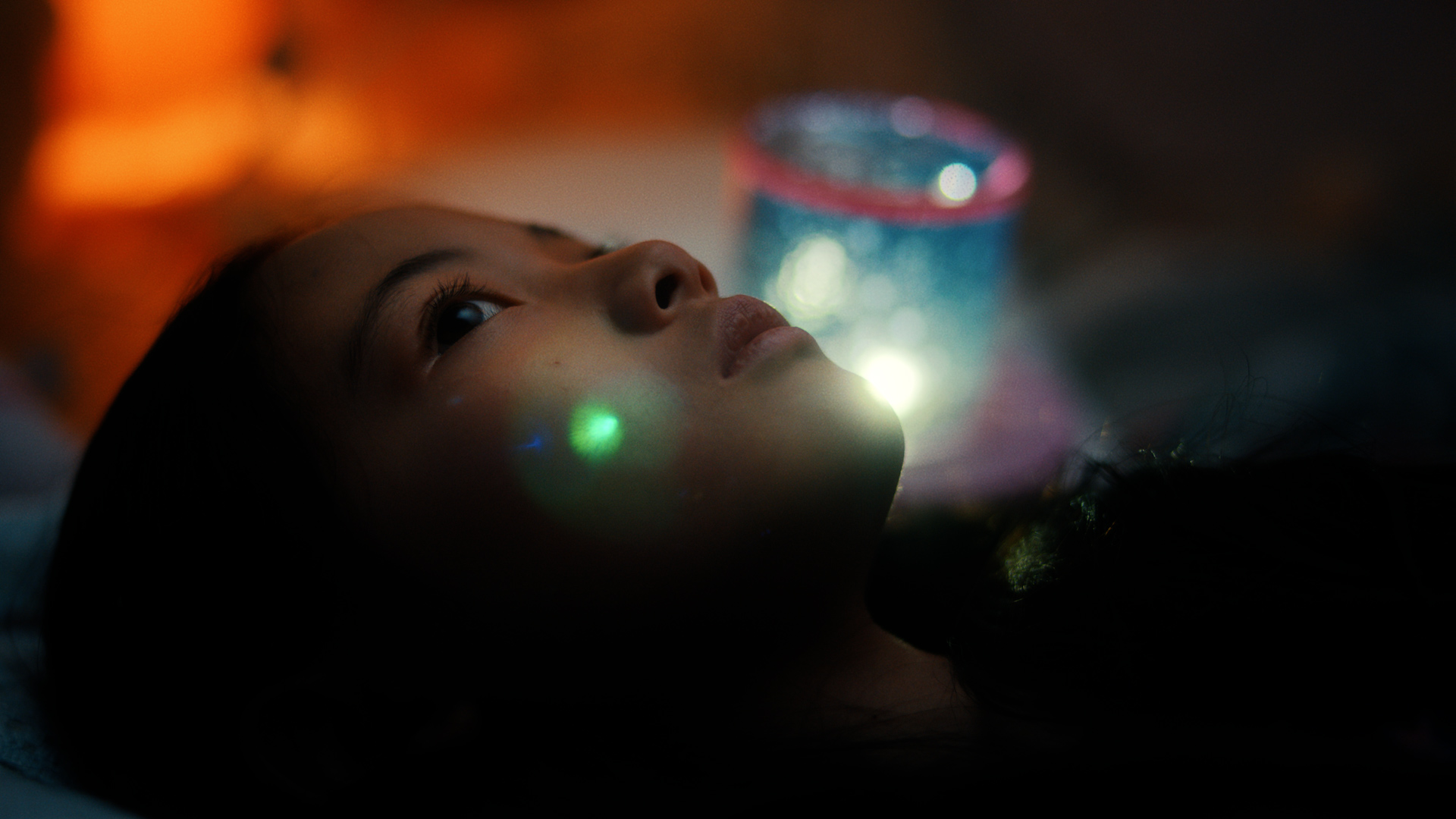 Girl laying on back and looking up